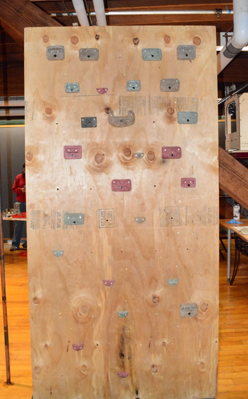 The finished plywood wall with holds attached